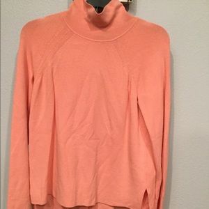 Pretty in pink, turtleneck sweater!